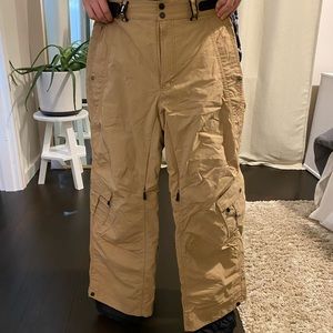 Men’s medium tan Bonfire snow pants. Used but in good condition.